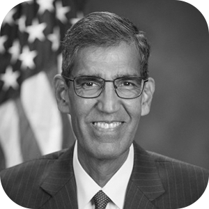 Black and white photo of Uttam Dhillon