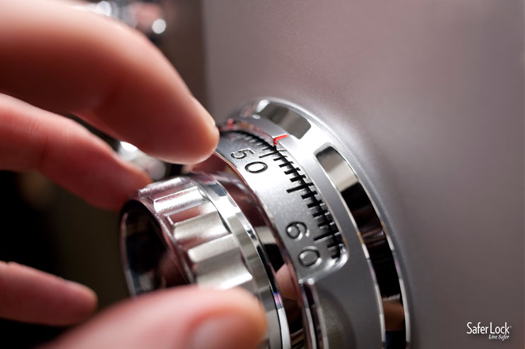 A hand opening a combination lock. 10 Reasons Your Home Needs a Medicine Lock Box
