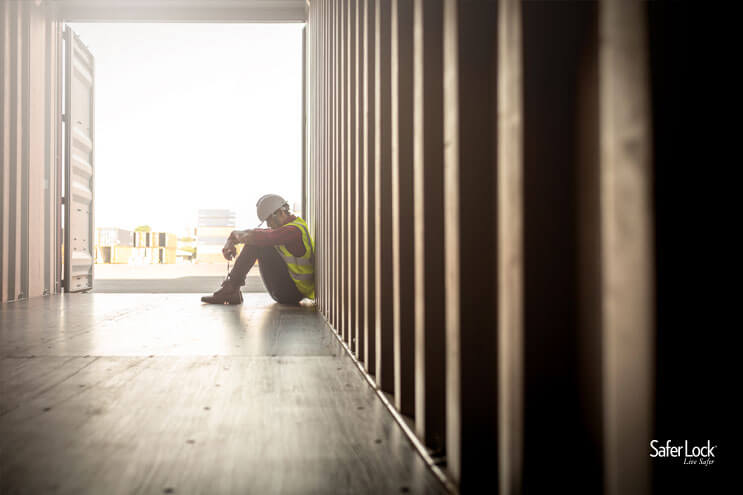 A construction worker resting on the job.